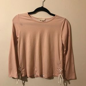 Girl’s pink and white shirt